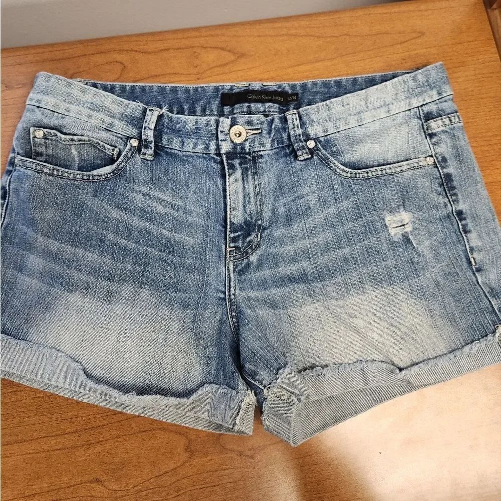 Calvin Klein Jean Shorts size 14/32.